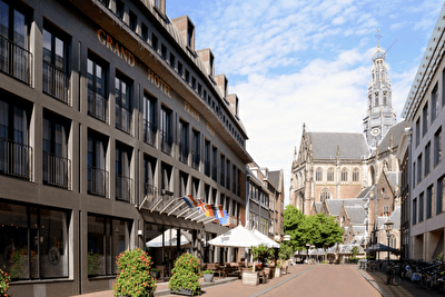 Amrâth Grand Hotel Frans Hals in Haarlem next to the Grote Kerk, modern facade with a classic setting.